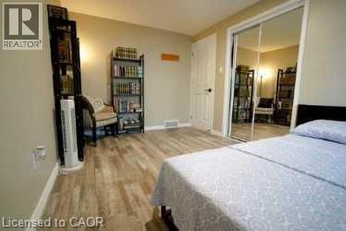 Bedroom featuring light wood-style flooring and a closet - 147 Muriel Crescent, London, ON - Indoor Photo Showing Bedroom