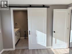 Bathroom featuring vanity and light wood-style floors - 