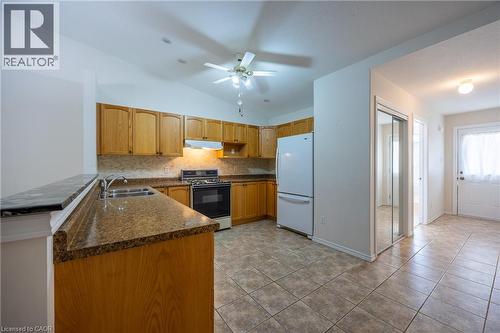 Another kitchen view with appliances included. - 510 Queensway W Unit# 5, Simcoe, ON - Indoor Photo Showing Kitchen With Double Sink