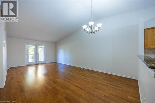 Living room and dining area. Doors to patio area. - 510 Queensway W Unit# 5, Simcoe, ON - Indoor