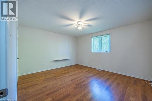 Primary bedroom with large west facing window. - 510 Queensway W Unit# 5, Simcoe, ON - Indoor Photo Showing Other Room
