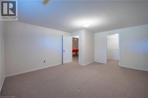 Large walk in storage closet in lower bedroom. - 510 Queensway W Unit# 5, Simcoe, ON - Indoor Photo Showing Other Room