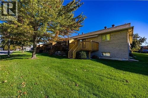 View of rear deck and shade tree. - 510 Queensway W Unit# 5, Simcoe, ON - Outdoor