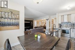 Eat-in kitchen, ample cabinet & counter space - 