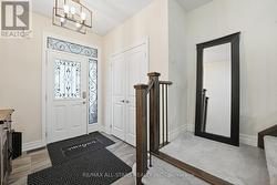 Spacious foyer with access to 2 car garage - 