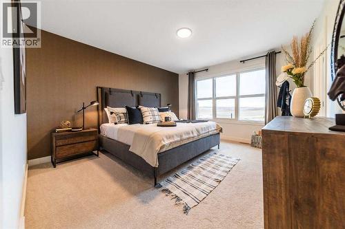 120 Southborough Common, Cochrane, AB - Indoor Photo Showing Bedroom