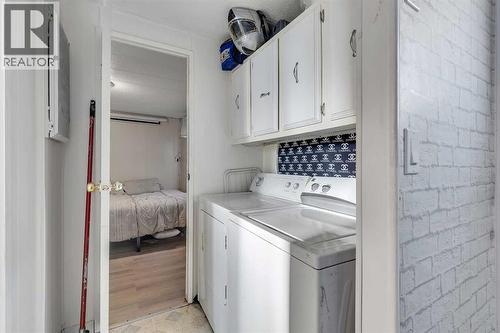 101 Huntstrom Drive Ne, Calgary, AB - Indoor Photo Showing Laundry Room