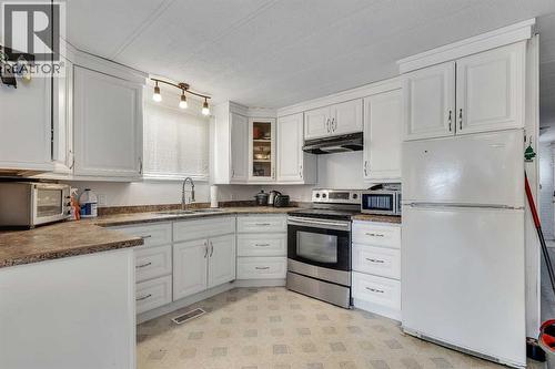 101 Huntstrom Drive Ne, Calgary, AB - Indoor Photo Showing Kitchen