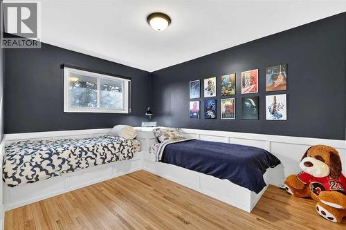 2 nd bdrm - 3231 25 Street Sw, Calgary, AB - Indoor Photo Showing Bedroom