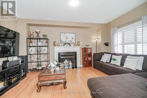 38 Bottlebrush Drive, Brampton, ON - Indoor Photo Showing Living Room With Fireplace