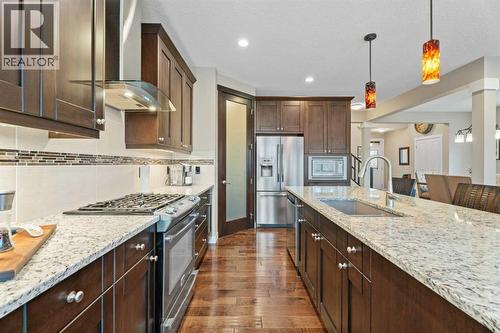 Tons of cabinetry & counter space - 199 Cranarch Landing Se, Calgary, AB - Indoor Photo Showing Kitchen With Upgraded Kitchen