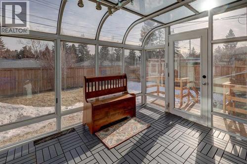 Sunroom located at the rear of the home is a great area for a mudroom, sitting room and provides extra storage space - 36 Glenview Drive Sw, Calgary, AB - Indoor Photo Showing Other Room