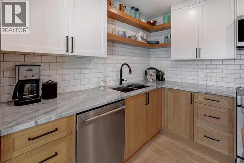 36 Glenview Drive Sw, Calgary, AB - Indoor Photo Showing Kitchen With Double Sink With Upgraded Kitchen