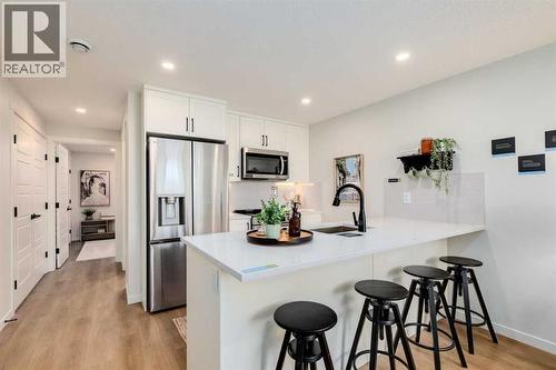 111, 155 Crimson Ridge Place NW  Calgary, AB T3L 2M4