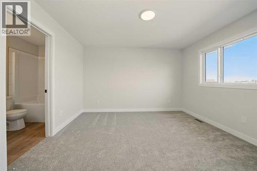 61 Pinnacle Close, Blackfalds, AB - Indoor Photo Showing Other Room