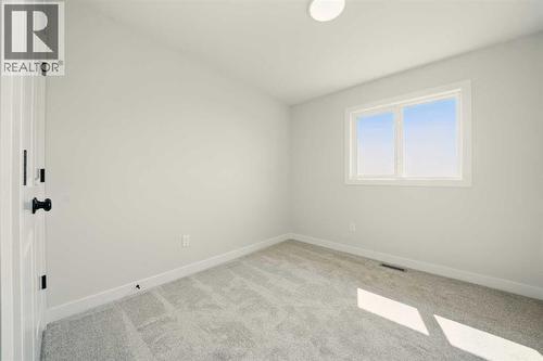 61 Pinnacle Close, Blackfalds, AB - Indoor Photo Showing Other Room
