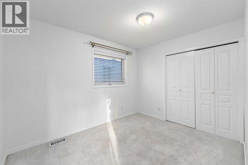 5503 Strathcona Hill Sw, Calgary, AB - Indoor Photo Showing Other Room