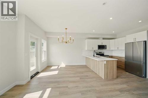 57 Pinnacle Close, Blackfalds, AB - Indoor Photo Showing Kitchen