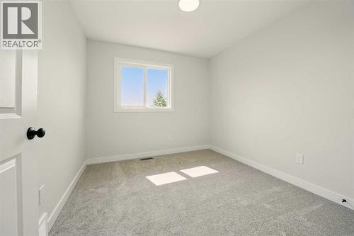57 Pinnacle Close, Blackfalds, AB - Indoor Photo Showing Other Room