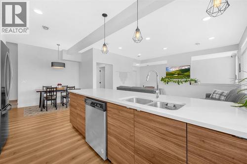 4397 Seton Drive Se, Calgary, AB - Indoor Photo Showing Kitchen With Double Sink