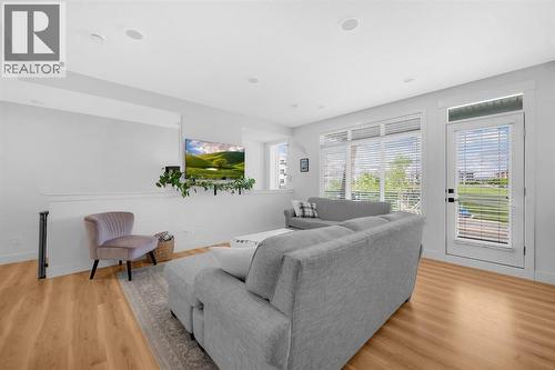 4397 Seton Drive Se, Calgary, AB - Indoor Photo Showing Living Room