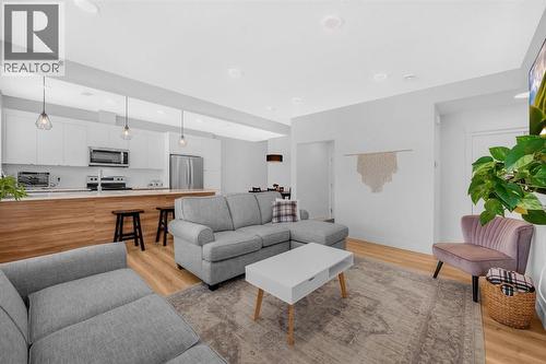 4397 Seton Drive Se, Calgary, AB - Indoor Photo Showing Living Room