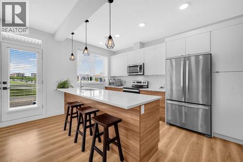 4397 Seton Drive Se, Calgary, AB - Indoor Photo Showing Kitchen With Upgraded Kitchen