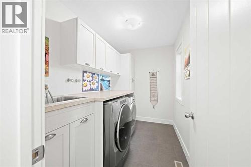 115 Mahogany Way Se, Calgary, AB - Indoor Photo Showing Laundry Room