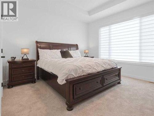 110 Sunstone Way, Balzac, AB - Indoor Photo Showing Bedroom