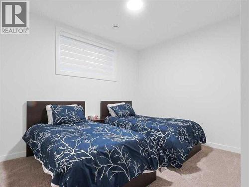110 Sunstone Way, Balzac, AB - Indoor Photo Showing Bedroom