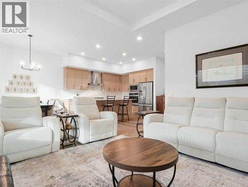 110 Sunstone Way, Balzac, AB - Indoor Photo Showing Living Room