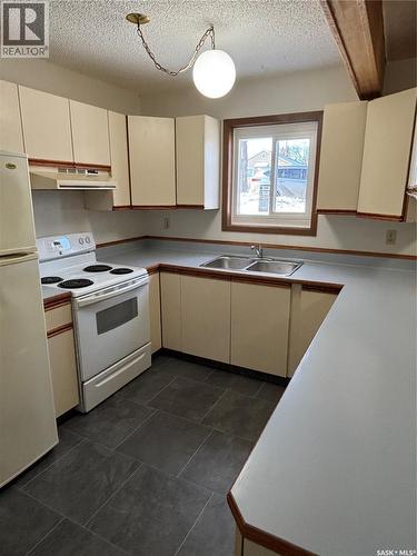 345 Scarth Street, Regina, SK - Indoor Photo Showing Kitchen With Double Sink