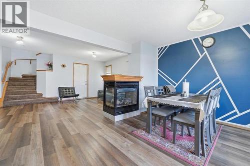 Dining Area - 218 Tarawood Place Ne, Calgary, AB - Indoor With Fireplace
