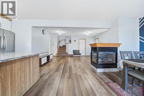 Updated Flooring - 218 Tarawood Place Ne, Calgary, AB - Indoor With Fireplace