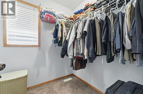 Walk in closet Master BED - 218 Tarawood Place Ne, Calgary, AB - Indoor With Storage