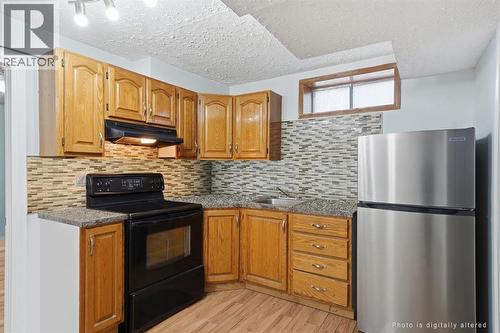 Basement Kitchen - 218 Tarawood Place Ne, Calgary, AB - Indoor Photo Showing Kitchen