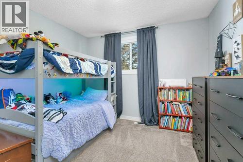 12 Rutherford Drive, Red Deer, AB - Indoor Photo Showing Bedroom