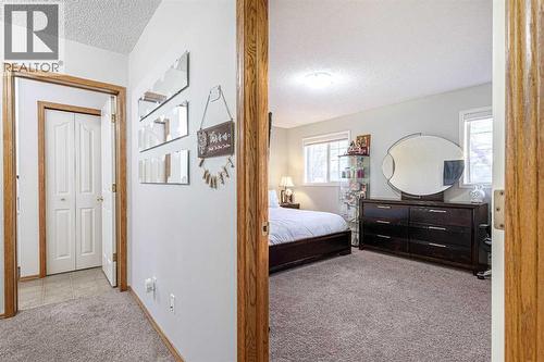 13 Mt. Aberdeen Manor Se, Calgary, AB - Indoor Photo Showing Bedroom