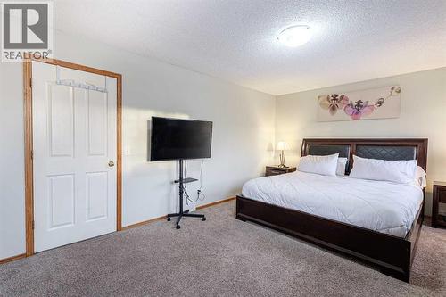 13 Mt. Aberdeen Manor Se, Calgary, AB - Indoor Photo Showing Bedroom