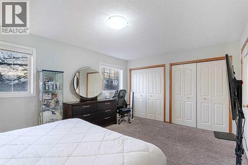 13 Mt. Aberdeen Manor Se, Calgary, AB - Indoor Photo Showing Bedroom