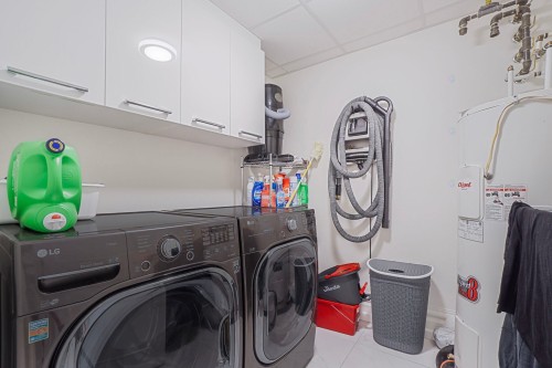 Salle de lavage - 901-3710 Boul. St-Elzear O., Laval (Chomedey), QC - Indoor Photo Showing Laundry Room
