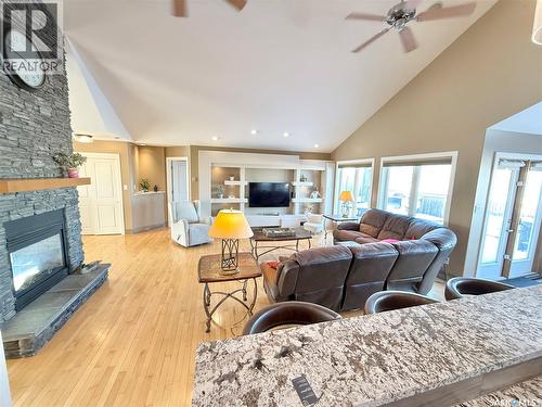 785 Washington Drive, Weyburn, SK - Indoor Photo Showing Living Room With Fireplace