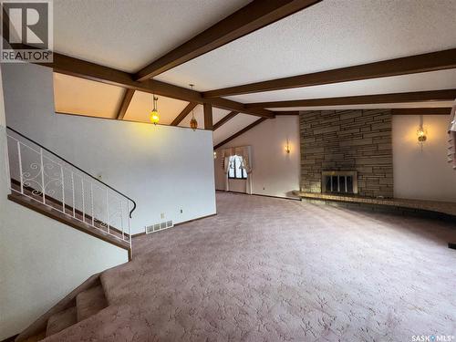503 7Th Avenue W, Biggar, SK - Indoor Photo Showing Other Room With Fireplace