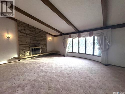 503 7Th Avenue W, Biggar, SK - Indoor Photo Showing Other Room With Fireplace