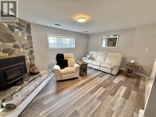 4487 Dick Road, Quesnel, BC - Indoor Photo Showing Living Room With Fireplace