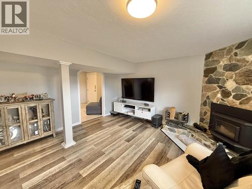 4487 Dick Road, Quesnel, BC - Indoor Photo Showing Living Room With Fireplace