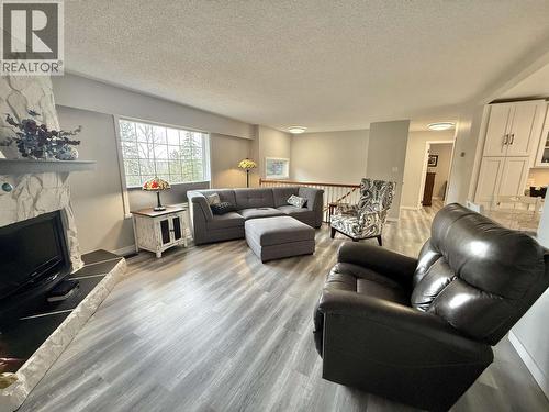 4487 Dick Road, Quesnel, BC - Indoor Photo Showing Living Room With Fireplace