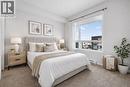 Virtual staging - 1410, 33 Carringham Gate Nw, Calgary, AB  - Indoor Photo Showing Bedroom 