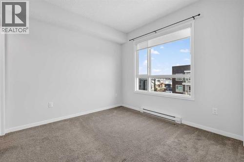 1410, 33 Carringham Gate Nw, Calgary, AB - Indoor Photo Showing Other Room