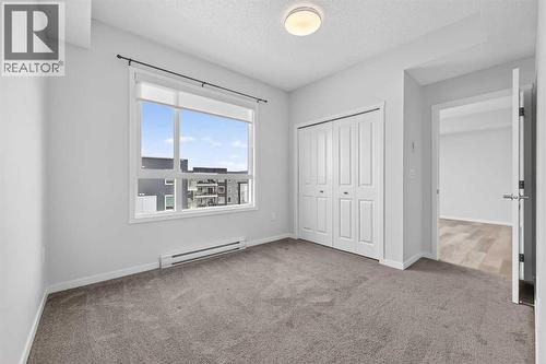 1410, 33 Carringham Gate Nw, Calgary, AB - Indoor Photo Showing Other Room